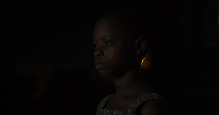 A single light shines in the dark