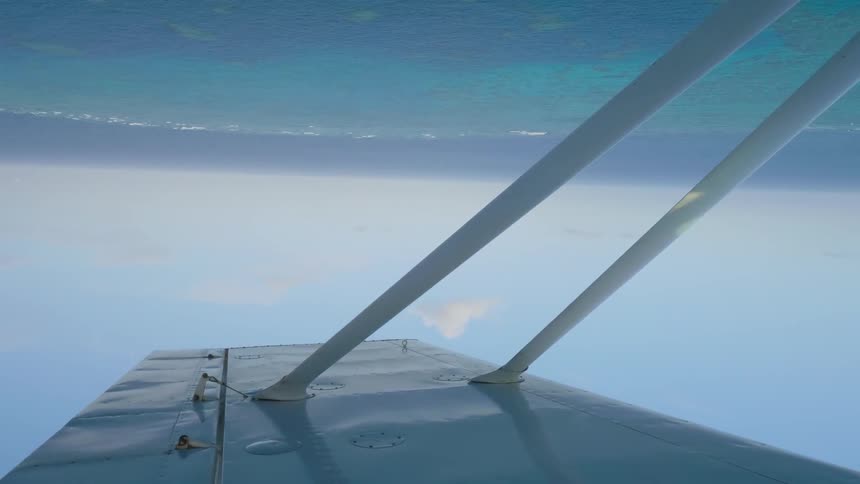 A plane is flying upside down
