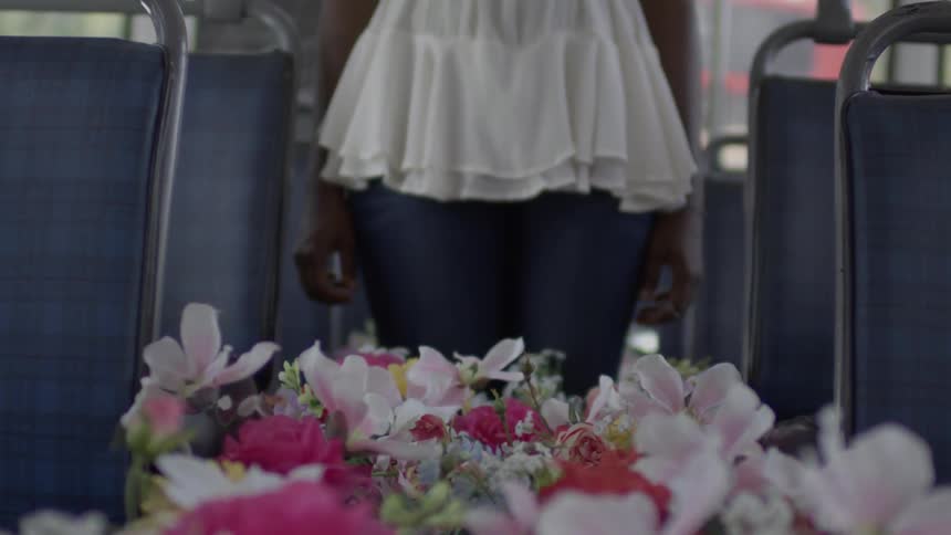 Bouquet of flowers between two rows of seats