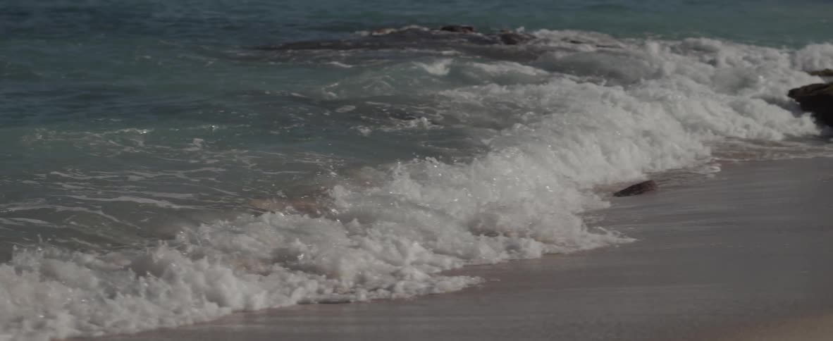 Waves are crashing in slow motion