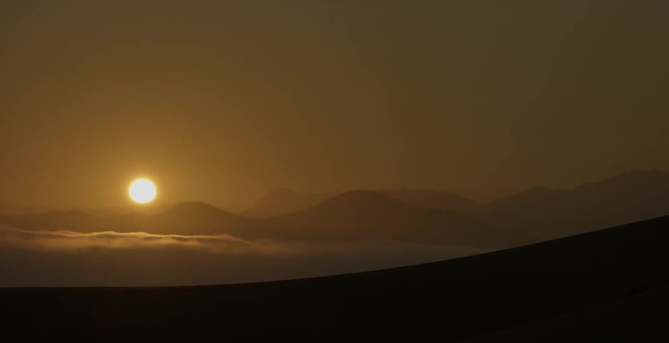 Sun setting over the desert