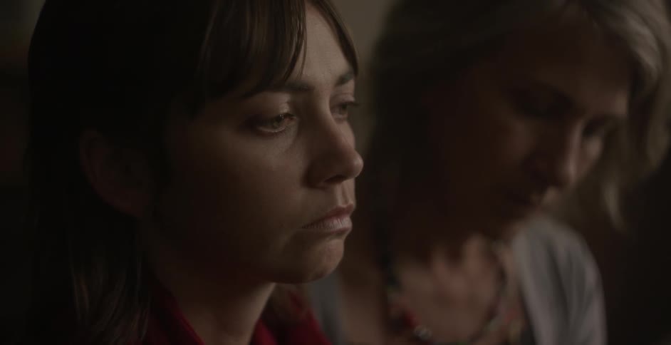 Two women look sad looking down