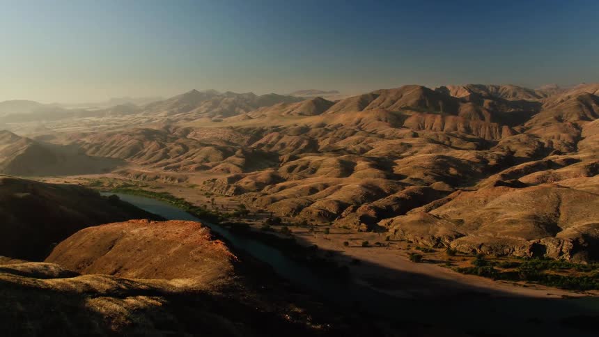 The mountains ahead have a river running through them