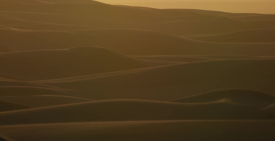 Wind is blowing sand around in the desert