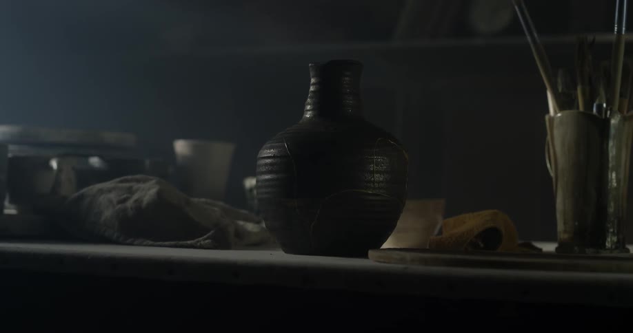 A person puts some items on the counter