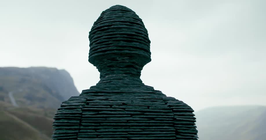 A statue is in the form of a person