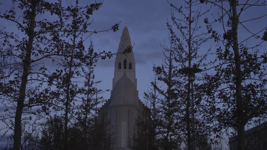 A church tower surrounded by trees