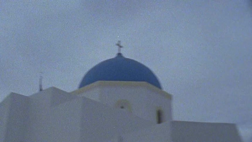 Flags flap on a cathedral roof