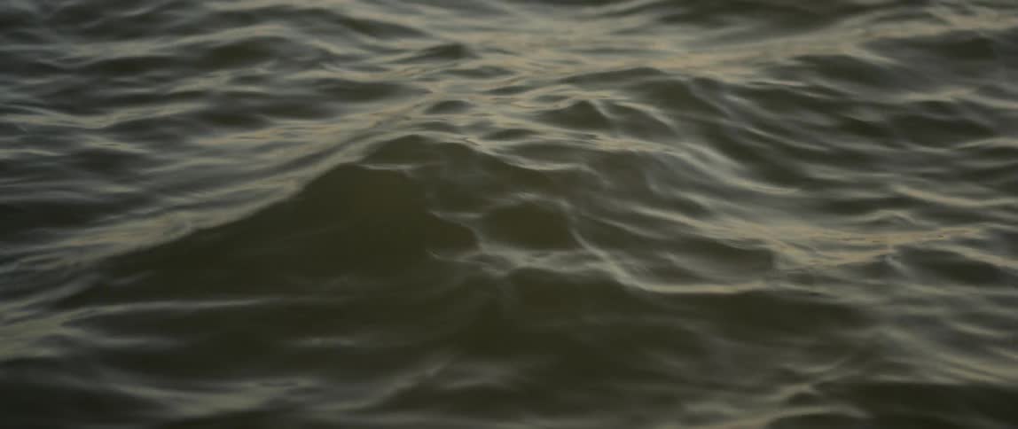 A body of water ripples and flows