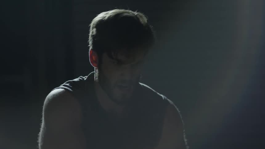 A man is playing the drums fast