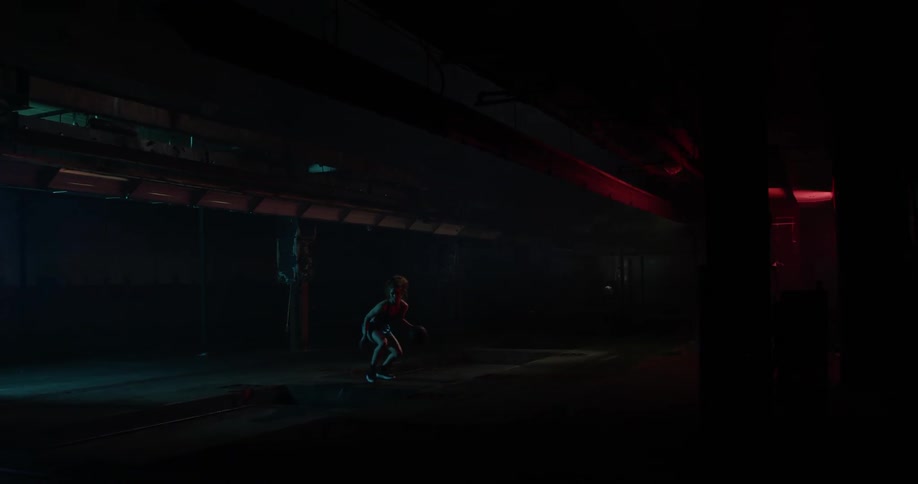 A woman is practicing her basketball defense at night