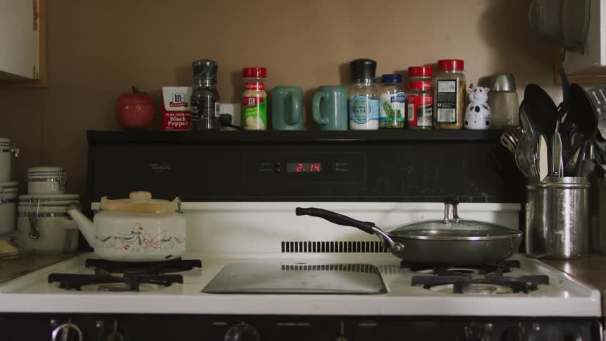 Stove covered in spices in home kitchen