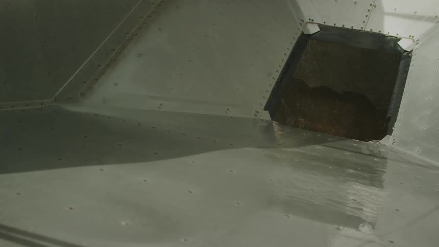 Someone hosing down a window