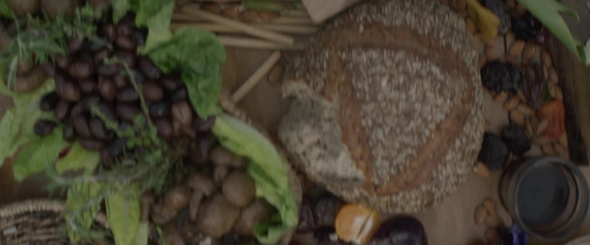 Food covers an outdoor table