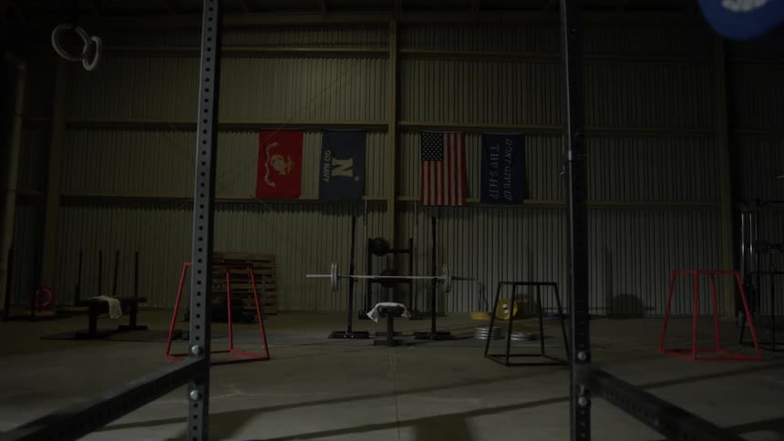 The gym is empty and dark
