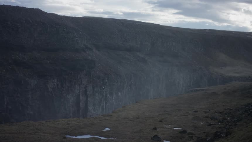 Cloudy sky over a canyon