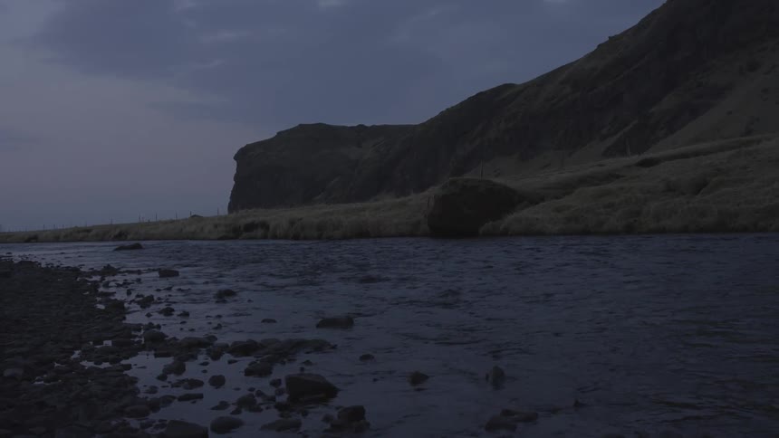 A rocky coast at dusk