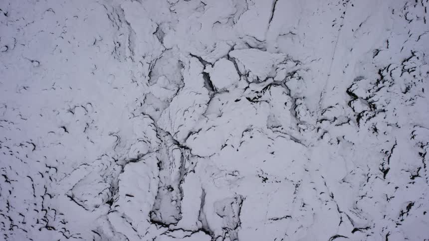 An aerial view of a snow covered ground,