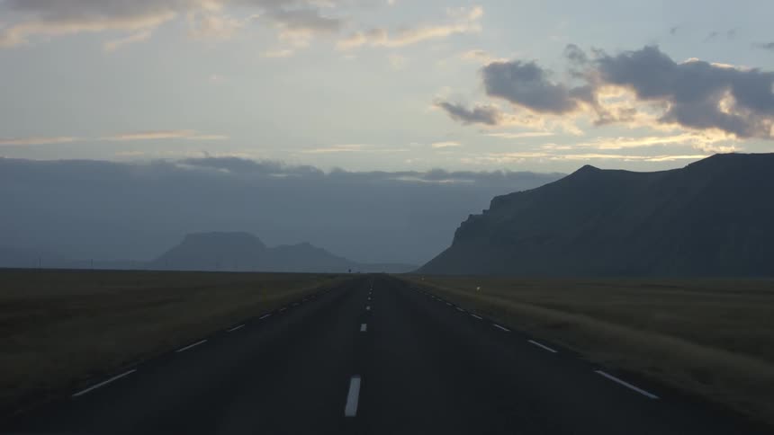 A vehicle moving on a highway road