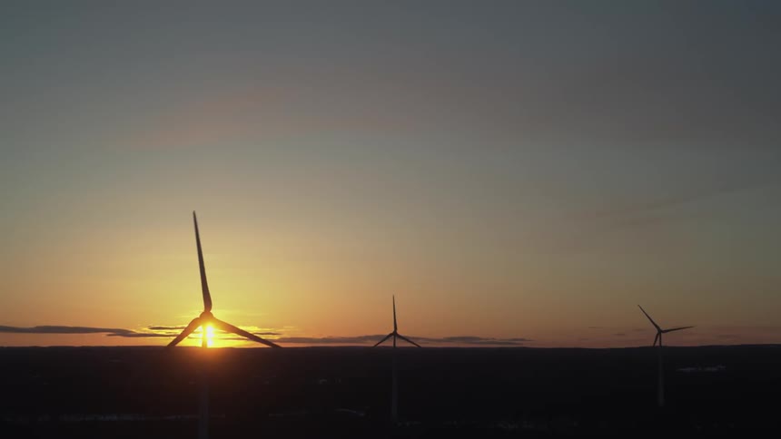 Three wind turbines spinning