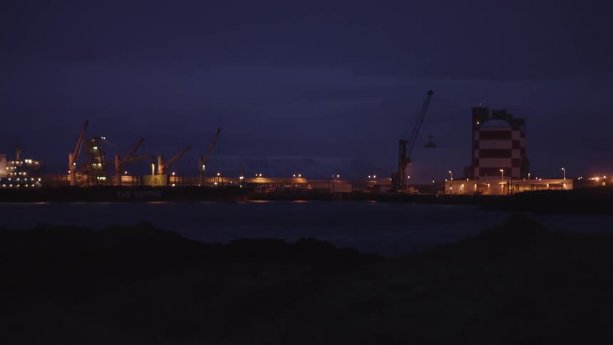 A lone ship at night