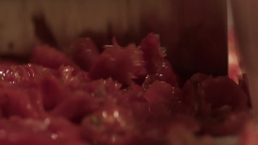 Red vegetables being chopped