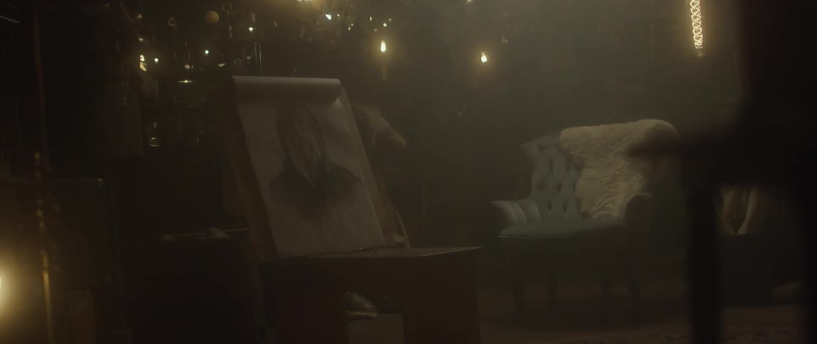 A portrait sits on a table