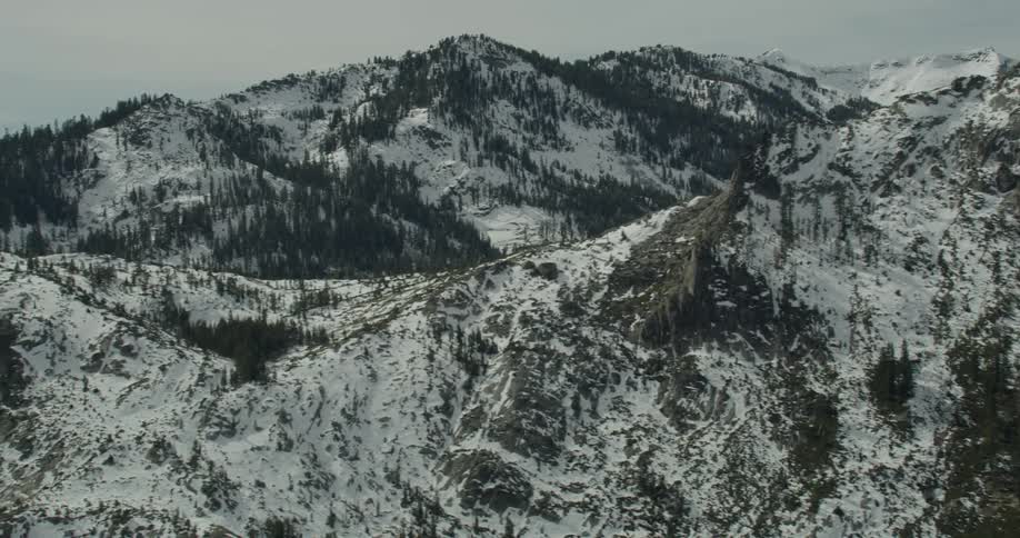 The tall mountain is covered with ice in Lake Tahoe, California