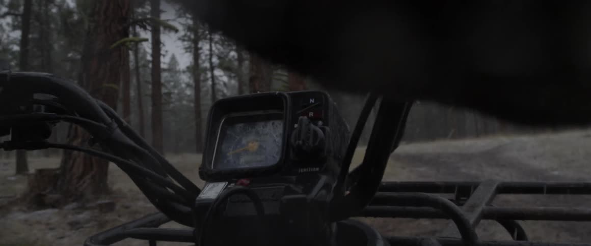 Off road vehicle travels through a forest