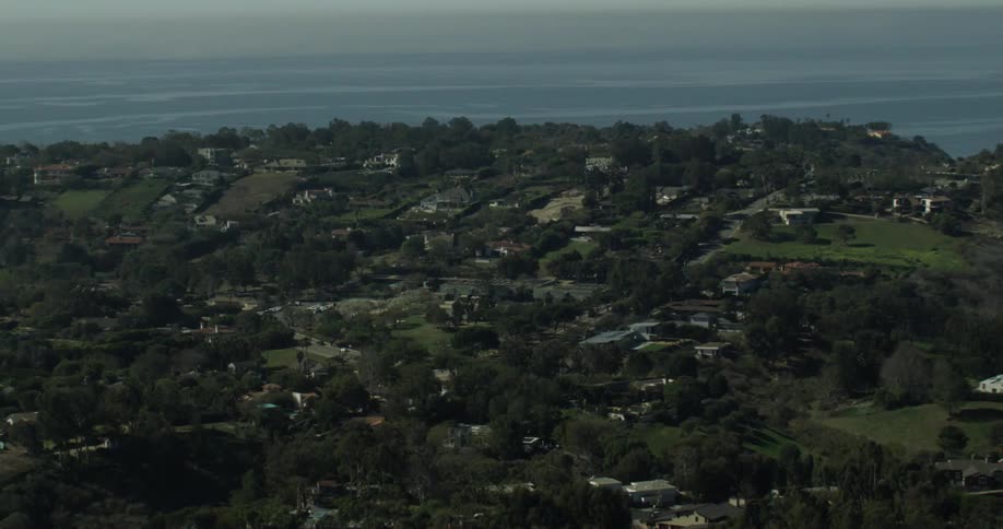 California town below is surrounded by water
