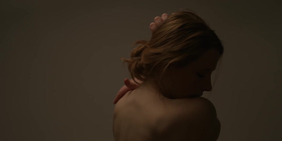 Woman grabs hair and shoulders