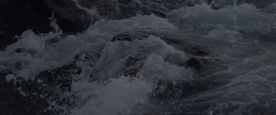 Waves crash onto some rocks