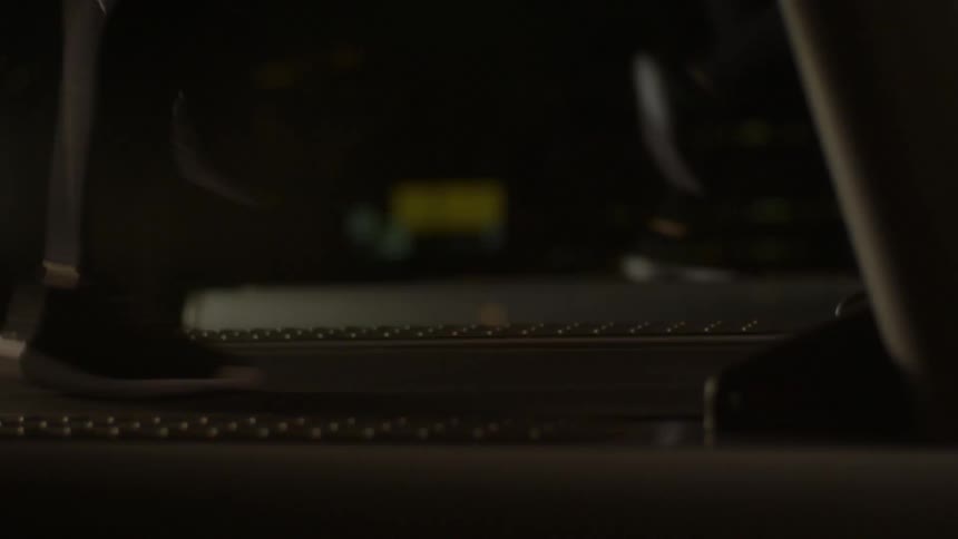 A person jogs on a treadmill