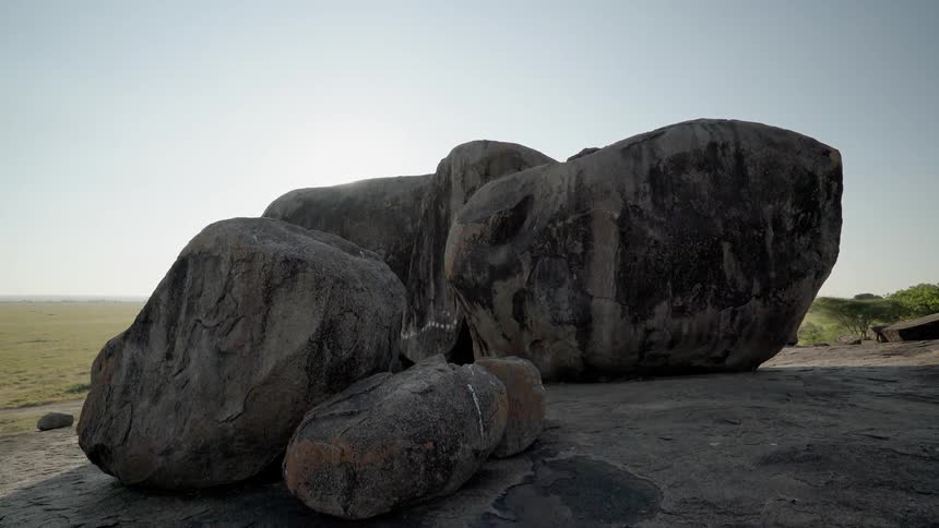 There are large boulders on this hillside