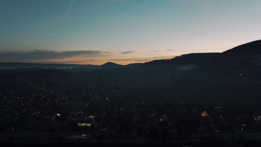 City lights illuminate the night sky