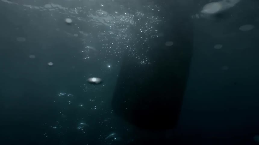 A paddle moves underwater