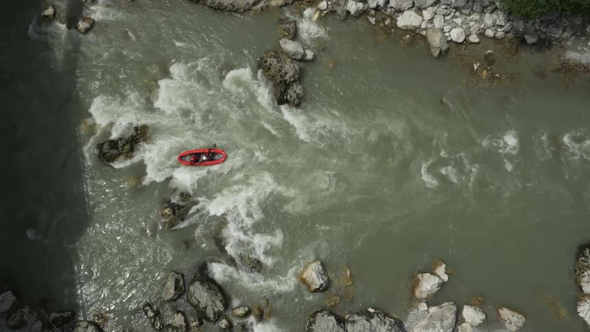 People rafting through a river