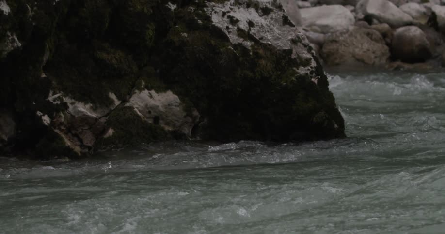Water splashes against the rocks