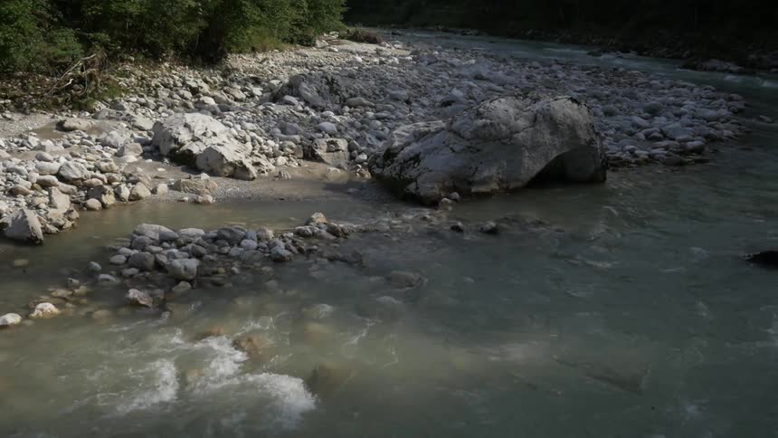 A river flows through a mountain forest