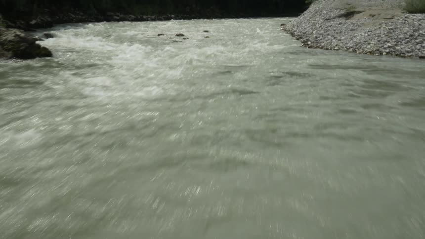 The rapids are fast on a sunny day
