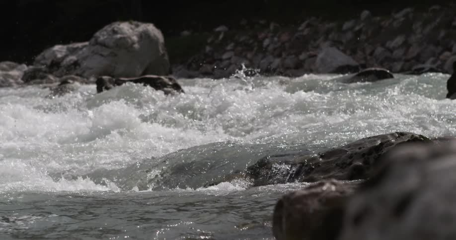 Water crashes over rocks