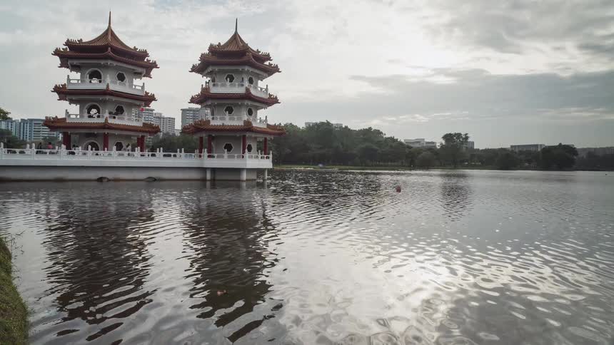 A time lapse of an asian town near the water