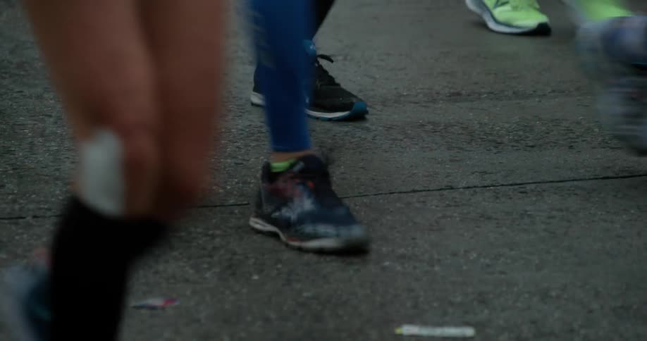 Marathon runners run in the street