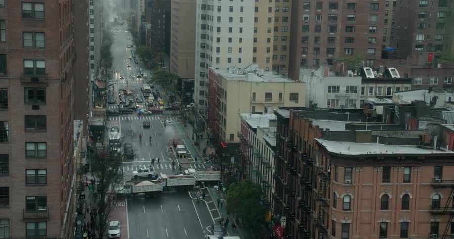 Vehicles and pedestrians commute in the city