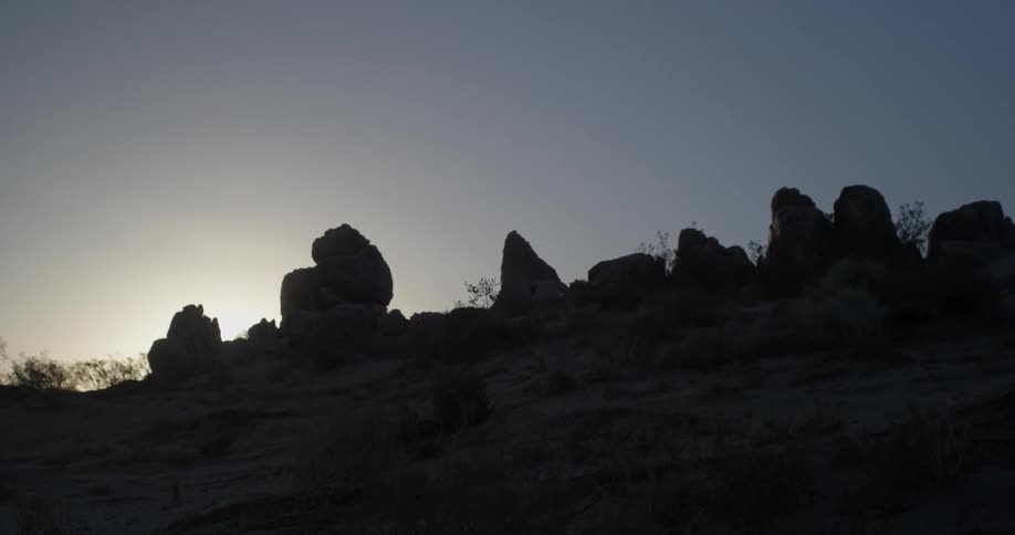 Rock formations sit atop a hill