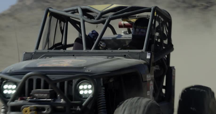 A man drives an off road vehicle