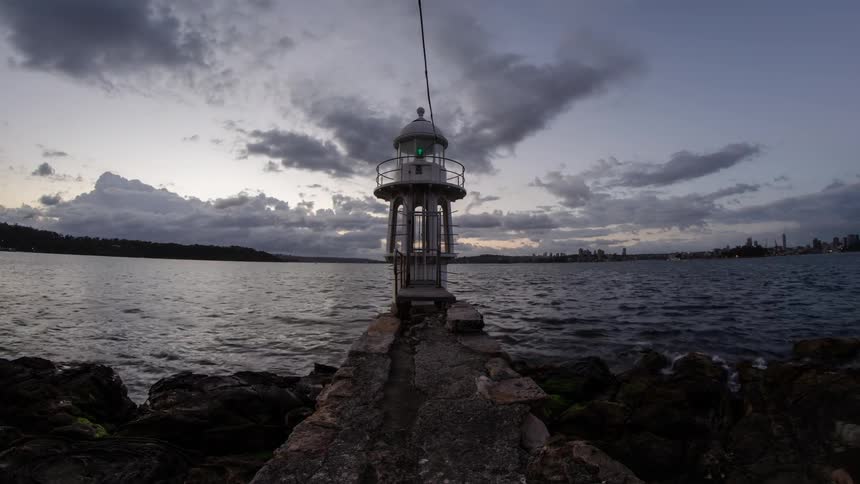 A warning light sits on the edge of the water