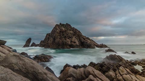 Long Exposure time lapse of rocky island on the coast