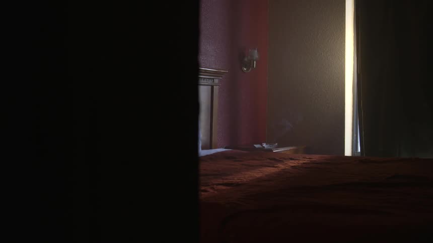 Sunlight streams through a bedroom window