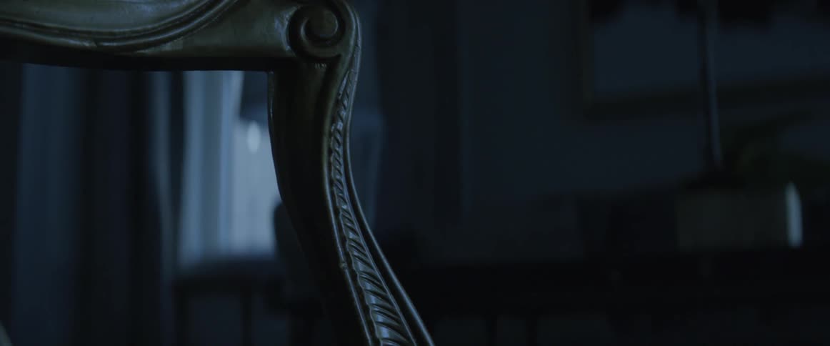 An empty chair is filmed close up